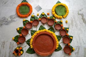 A Full set earthenware is ready to served bengali dishes in Rice Ceremony photo