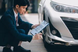 A young businesswoman is navigating car insurance options at her desk, considering premiums, deductibles, and coverage while understanding policies and managing claims efficiently. photo