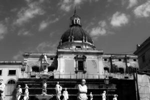 Piazza Pretoria is located on the edge of the Kalsa district, near the corner of Cassaro with Via Maqueda, a few meters from Quattro Canti, the exact center of the historic city of Palermo. photo