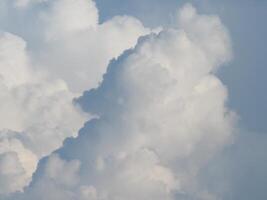 clouddy like soft powder and mountain on blue sky photo