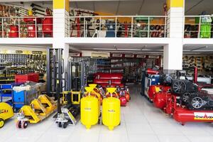 BAKU, AZERBAIJAN - May 20, 2022. Electrical equipment, high-pressure devices for washing cars by Omax are on sale in the store photo