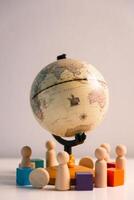 Embracing diversity and inclusion, the global community joins hands in oneness, fostering connection, cooperation, harmony, peace, and support across the earth. diversity, inclusion, globe, earth. photo