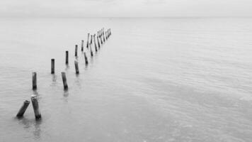 Beach Serenity.Old Posts and Calm Waters photo