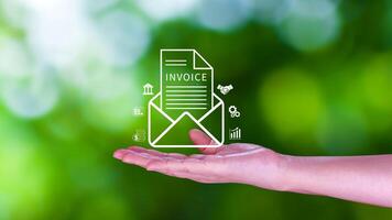 Invoice and online digital statements concept, using touch with invoice icons on virtual screen, Financial report and bank management with online payment concept E.invoice invoice. photo