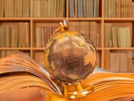 globes on the background of books.Conceptual training on the topics of education photo
