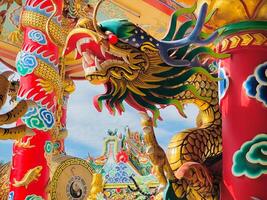 Dragon statue,dragon symbol,dragon Chinese is a beautiful Thai and Chinese architecture of shrine, temple.Symbol of good luck and prosperity during the Chinese New Year celebrations. photo
