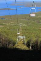 Symmetric shot of chairlift in Abisko, Sweden photo