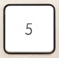 Button 5 from a modern numpad. photo