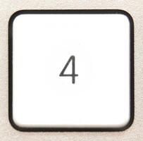 Button 4 from a modern numpad. photo
