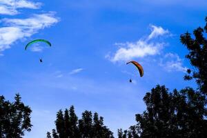 Paragliding on the mountains, Puncak Bogor, West java, indonesia. photo