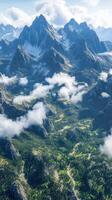 Majestic mountain landscape with lush valleys and clouds photo