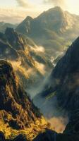 Breathtaking mountain landscape with mist and sunlight photo