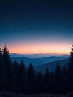 A beautiful night sky with stars and mountains in the background photo