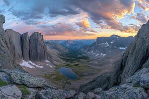 A panoramic view of the mountains at sunset photo