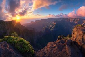 The sun sets over the mountains in this photo