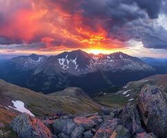 A colorful sunset over a mountain range photo