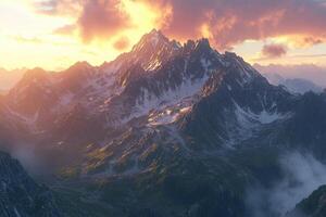 A mountain range with clouds and sun setting over it photo