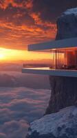 A house on top of a mountain with a view of the sunset photo