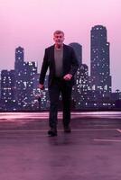 Confident Gentleman Walking in an Urban Evening Cityscape. photo