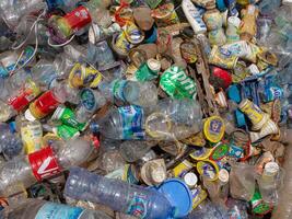 A pile of collected unsorted single use plastic bottle to be recycled an enviromental problem in rise due to consumerism habit photo