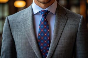 Stylish young man in suit and tie. Business style. Fashionable image. Office worker photo