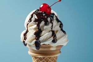 An ice cream cone with chocolate and cherry on top photo