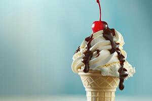 An ice cream cone with chocolate and cherry on top photo