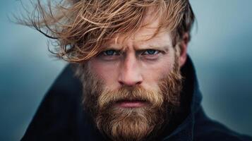 A man with a beard and long hair photo