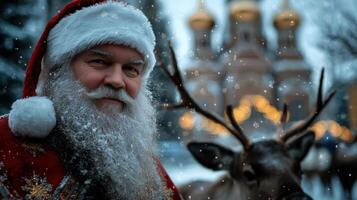 Santa claus and reindeer in the snow photo