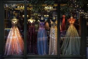 A window display of dresses in a store photo