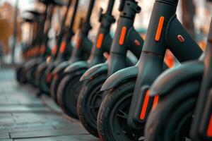 A row of electric scooters are lined up on the street photo