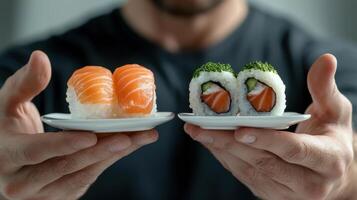 A man holding two plates with sushi and salmon photo