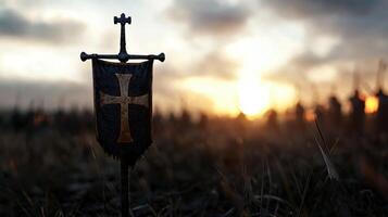 A knight's sword is standing in the middle of a field photo