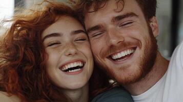 A man and woman smiling together photo