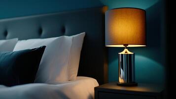 A bed with a lamp on it photo
