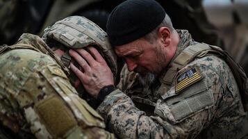A man in a military uniform is comforting another man photo