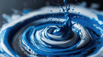 A blue liquid is being poured into a swirl photo