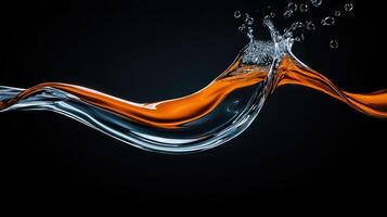 Water splash with orange liquid on black background photo