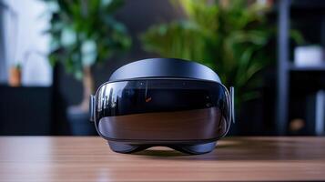 A black virtual reality headset sits on a wooden table photo