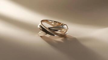 A gold ring with a curved design photo