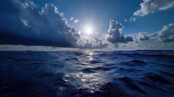 The sun shines over the ocean in this photo