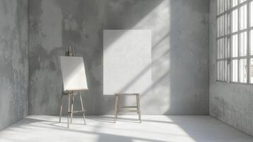 Two easels and a blank canvas in an empty room photo