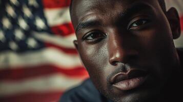 A man with an american flag in the background photo