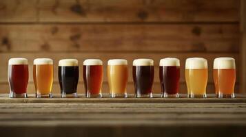 A row of beer glasses lined up on a table photo