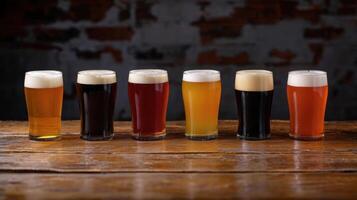 Six different types of beer are lined up on a table photo