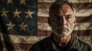 A man with a beard and an american flag in the background photo