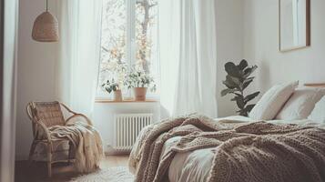 A bedroom with a bed, chair and window photo