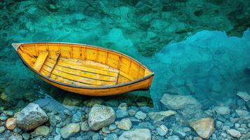 A yellow boat floating on the water photo