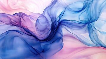 Soft, translucent fabric in flowing hues of pink and blue creates an elegant, abstract pattern that evokes a sense of tranquility and movement photo