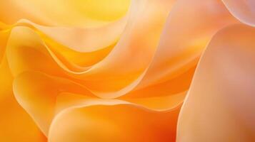 Warm shades of orange fabric flow gracefully in soft, undulating waves, creating an abstract pattern that exudes comfort and tranquility, illuminated by light photo